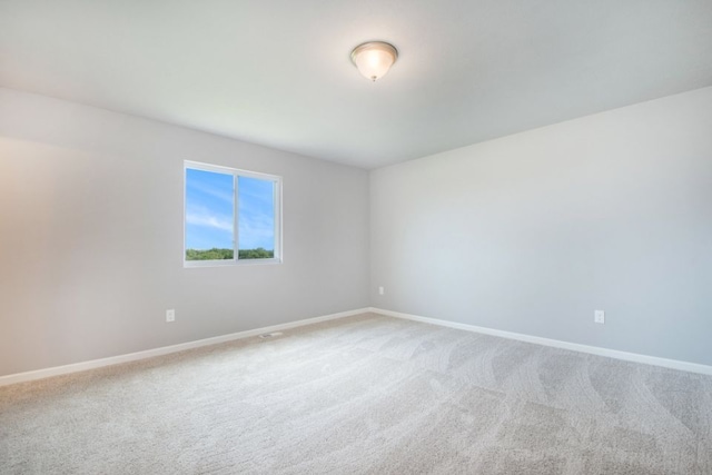 spare room with carpet