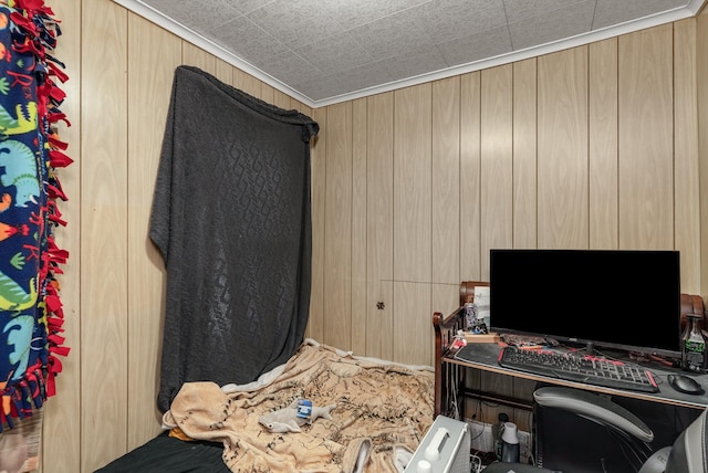 bedroom with wood walls