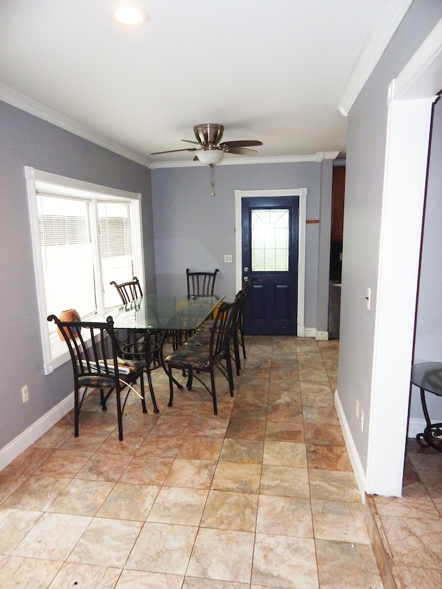 dining space featuring ceiling fan, a healthy amount of sunlight, and ornamental molding