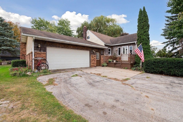 ranch-style house featuring a garage