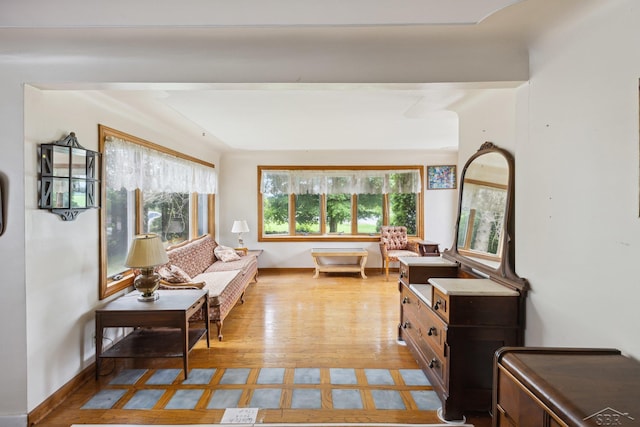 living area with light hardwood / wood-style floors