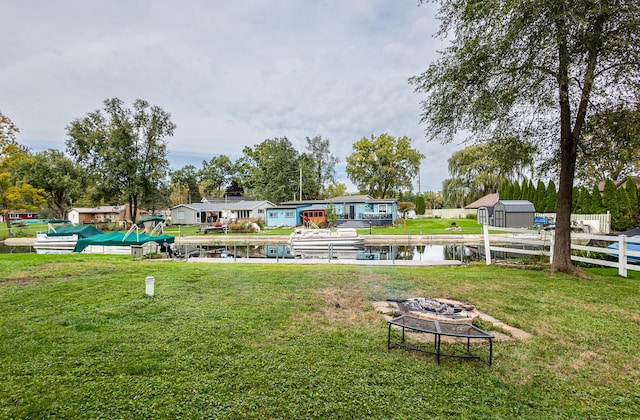 482 Swan Ln, Coldwater, MI 49036 - view of yard featuring an outdoor fire pit and a water view
