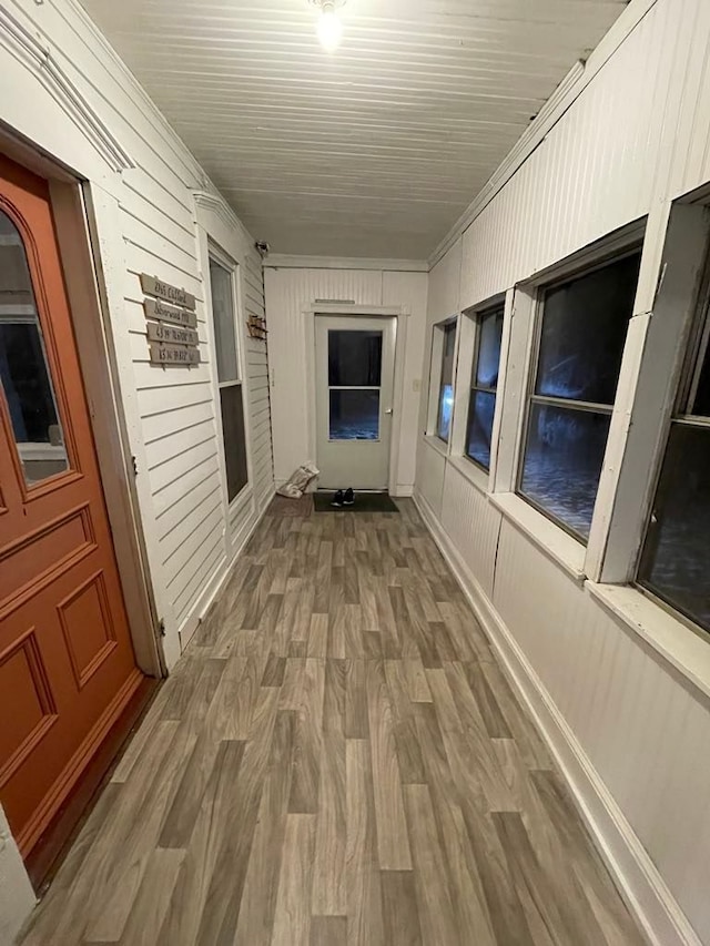 hallway featuring hardwood / wood-style floors