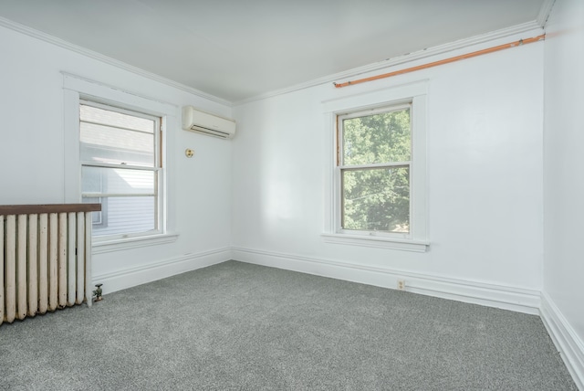 carpeted empty room featuring an AC wall unit, ornamental molding, and radiator