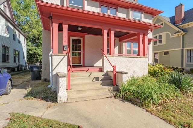 view of front of property featuring covered porch