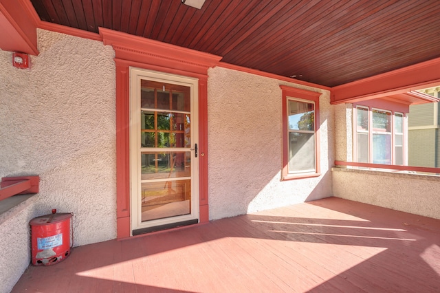 doorway to property featuring a porch