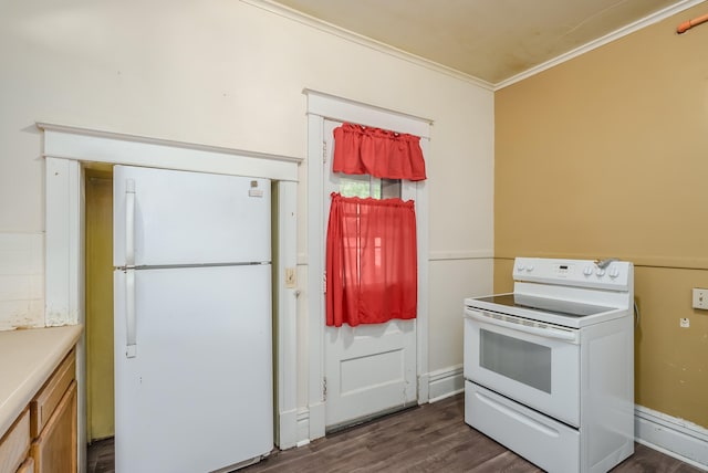 kitchen with white appliances, ornamental molding, and dark wood-type flooring