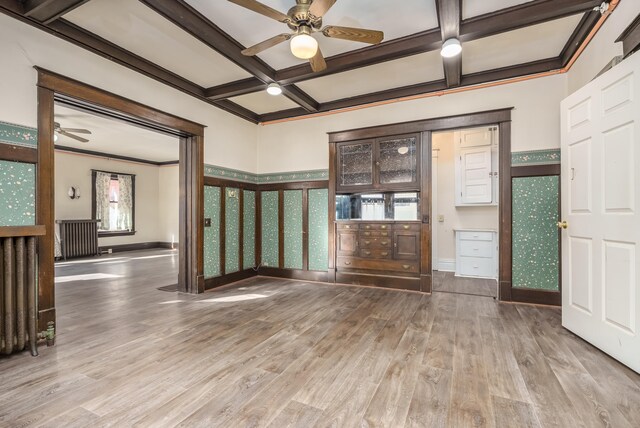 foyer featuring ceiling fan, beamed ceiling, coffered ceiling, and hardwood / wood-style flooring