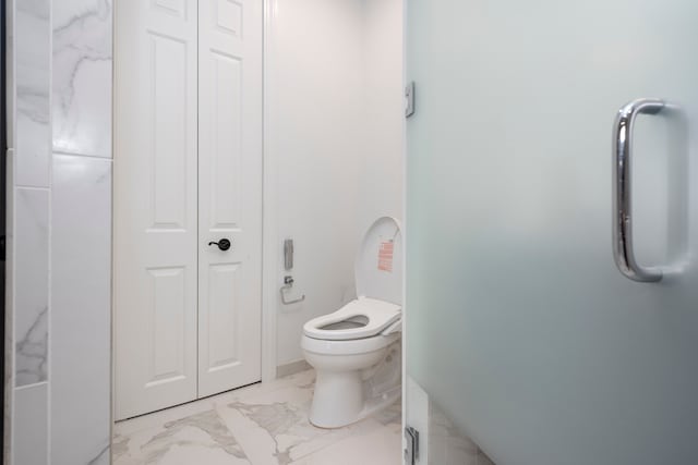 bathroom featuring toilet