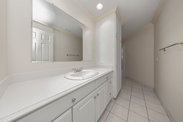 bathroom with vanity, tile patterned floors, and ornamental molding