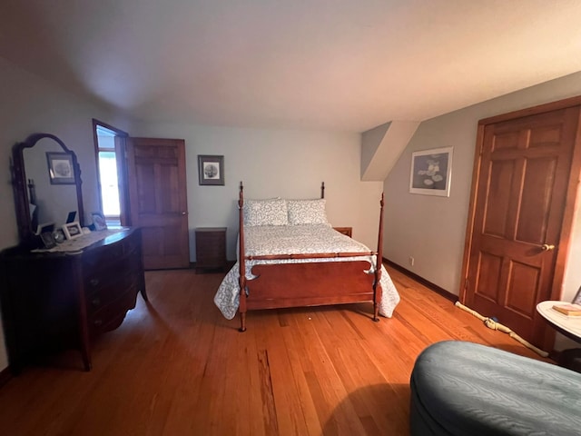 bedroom with wood-type flooring