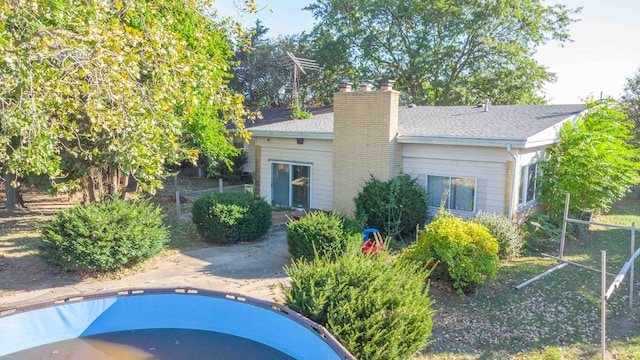 rear view of house featuring a patio area