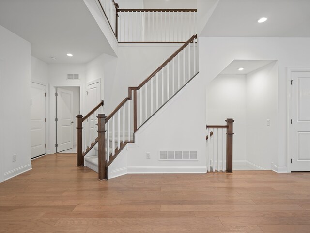 3318 Roseford Blvd, Ann Arbor, MI 48105 - entrance foyer featuring light wood-style floors, baseboards, recessed lighting, and stairs