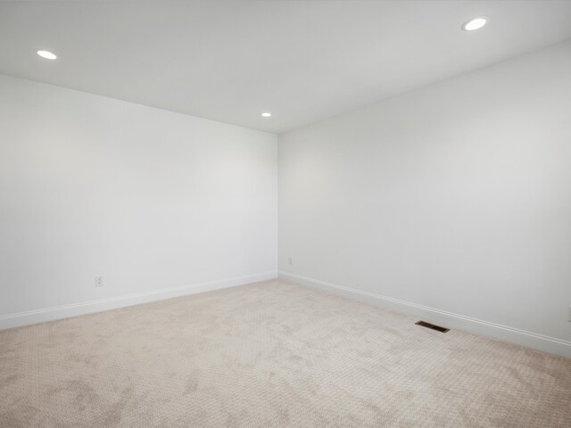 3318 Roseford Blvd, Ann Arbor, MI 48105 - empty room featuring recessed lighting, light colored carpet, and baseboards