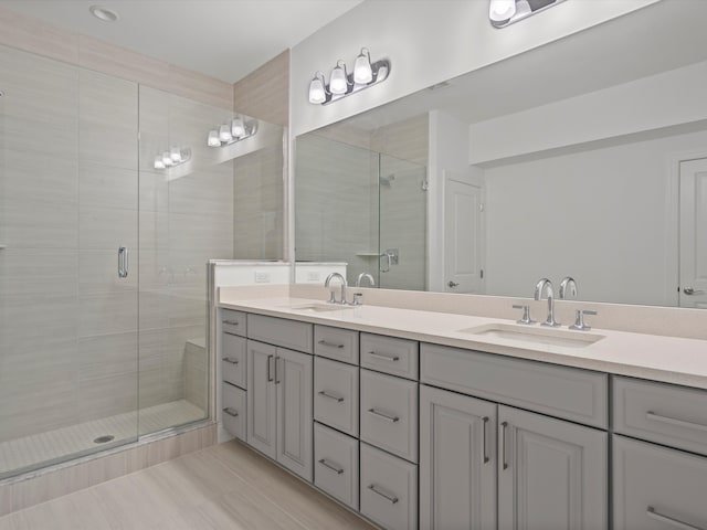 bathroom featuring vanity and walk in shower