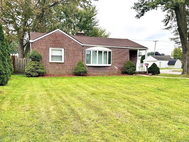 view of front of home with a front yard