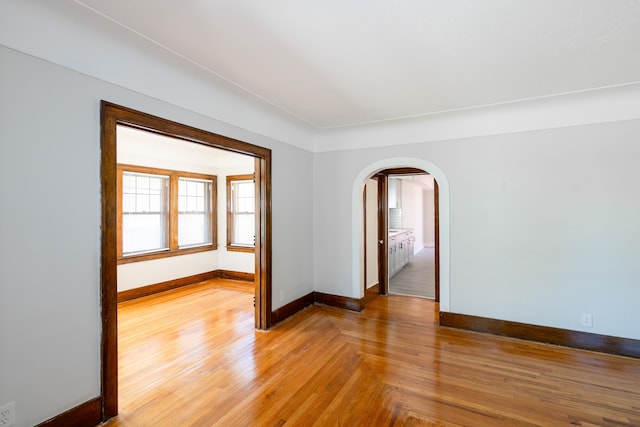 spare room featuring light hardwood / wood-style flooring