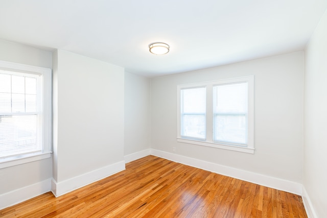 empty room with light wood-type flooring