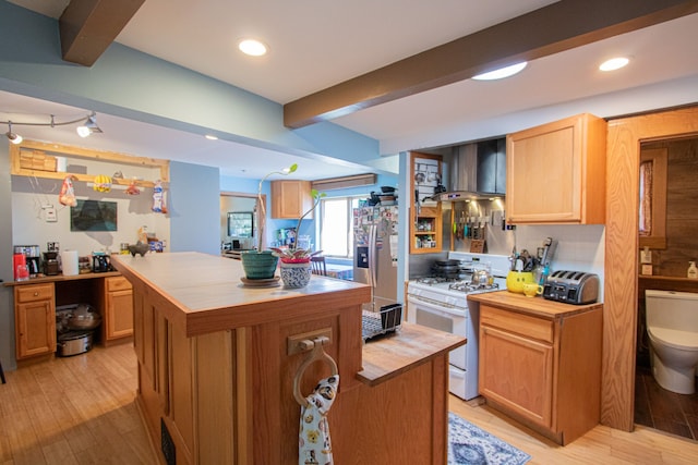 39357 Cheshire St, Westland, MI 48186 - kitchen with butcher block counters, white gas range, beam ceiling, a center island, and wall chimney exhaust hood