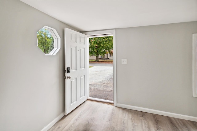 foyer with light hardwood / wood-style flooring