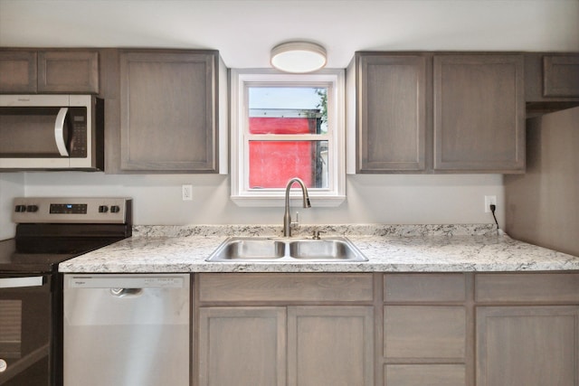 kitchen with sink and stainless steel appliances