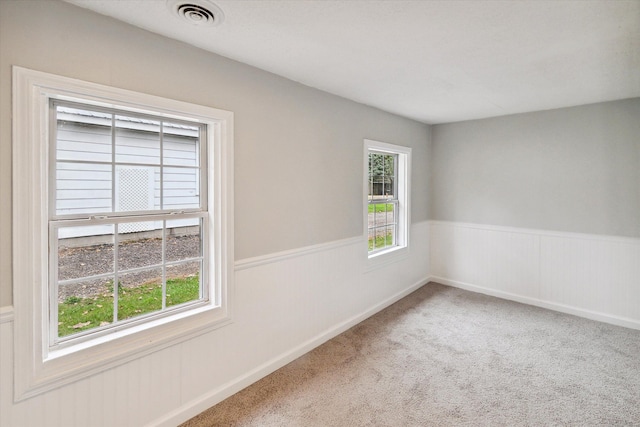 unfurnished room with carpet