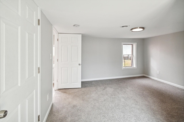 view of carpeted spare room