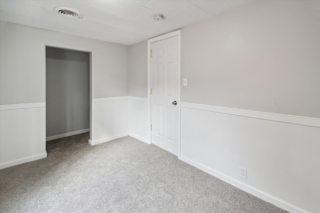 unfurnished room with carpet