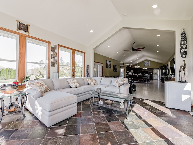 living room featuring french doors, vaulted ceiling, and ceiling fan