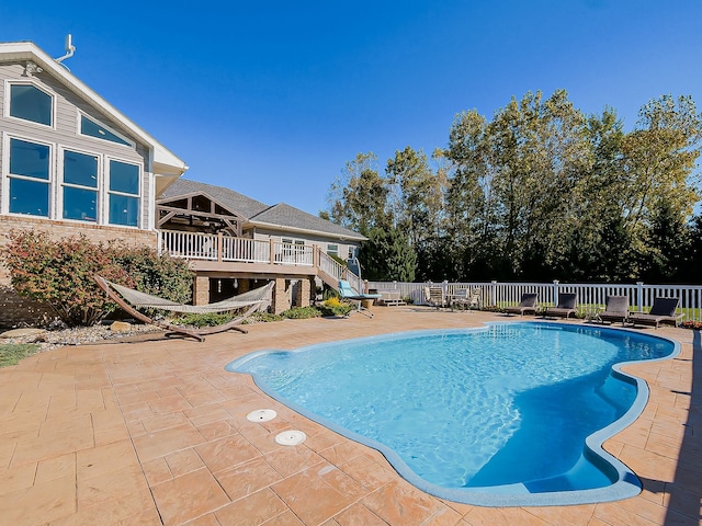 view of swimming pool featuring a patio