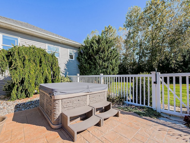 view of patio / terrace featuring a hot tub