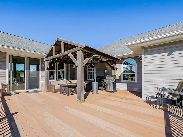 wooden deck with outdoor lounge area