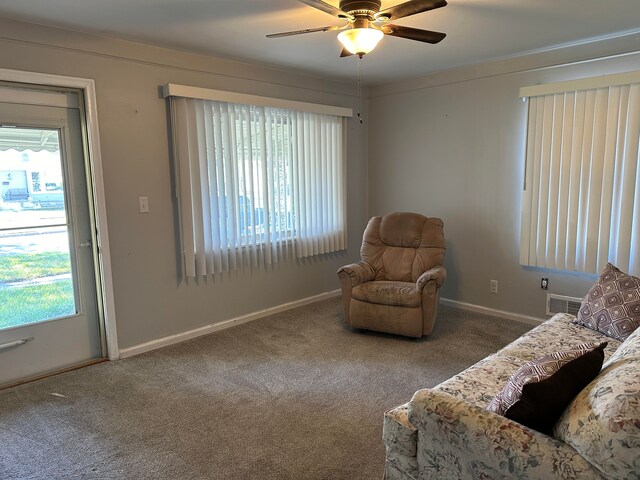 13676 Oakdale St, Southgate, MI 48195 - sitting room with ceiling fan, carpet floors, and baseboards