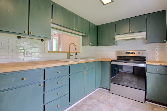 kitchen with tasteful backsplash, stainless steel electric range oven, and sink