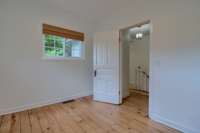 empty room with light wood-type flooring