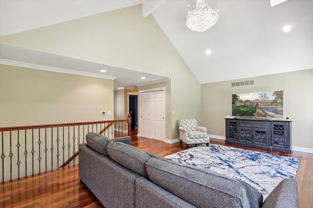 living room with beamed ceiling, high vaulted ceiling, a notable chandelier, hardwood / wood-style floors, and ornamental molding