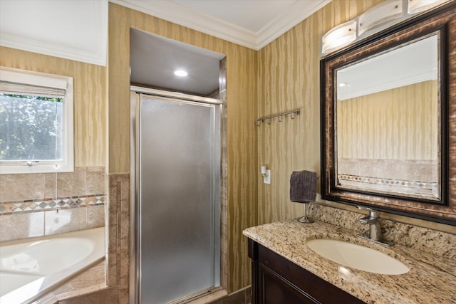 bathroom with vanity, separate shower and tub, and ornamental molding