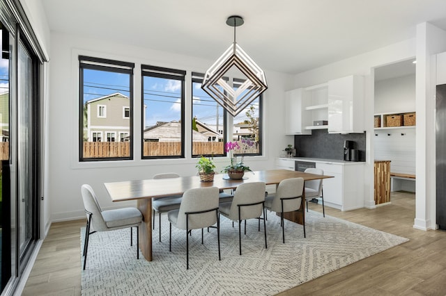 dining room featuring light wood-type flooring