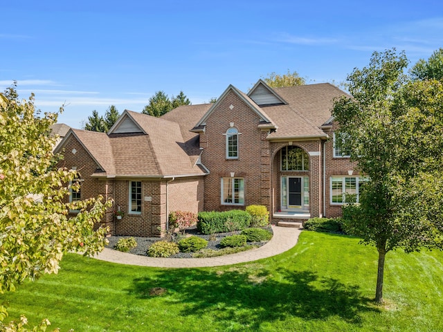 view of property with a front lawn