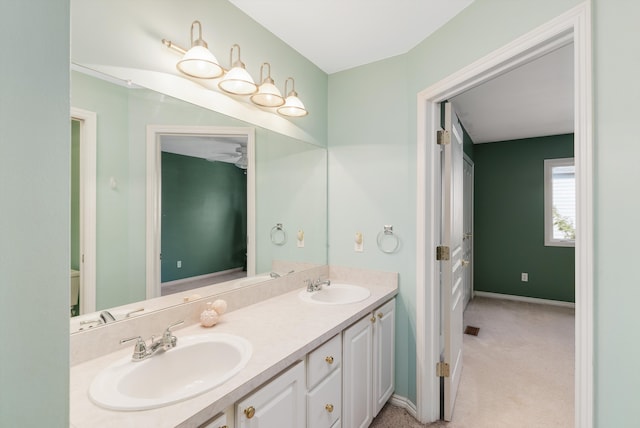 bathroom with vanity and toilet