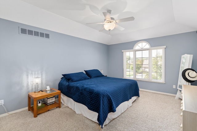 bedroom with ceiling fan and carpet floors