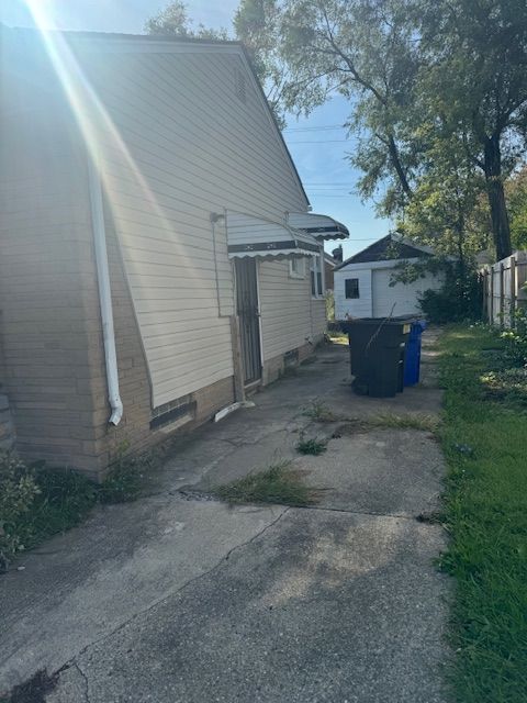 16813 Tireman St, Detroit, MI 48228 - view of home's exterior with driveway