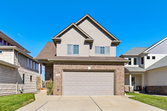 22461 Milner St, Saint Clair Shores, MI 48081 - view of front of property featuring a shingled roof, an attached garage, brick siding, and concrete driveway