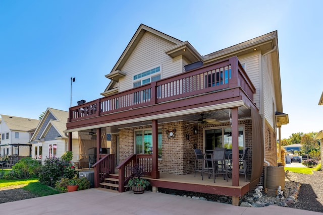 22461 Milner St, Saint Clair Shores, MI 48081 - view of front of house featuring a balcony, ceiling fan, and brick siding