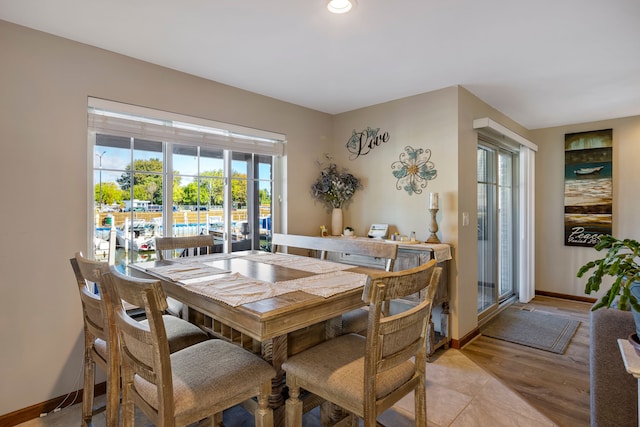 22461 Milner St, Saint Clair Shores, MI 48081 - dining room featuring baseboards, light wood-style floors, and recessed lighting