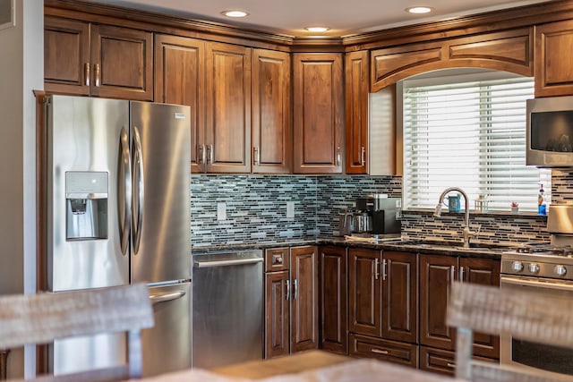 22461 Milner St, Saint Clair Shores, MI 48081 - kitchen featuring a sink, tasteful backsplash, dark stone countertops, stainless steel appliances, and recessed lighting