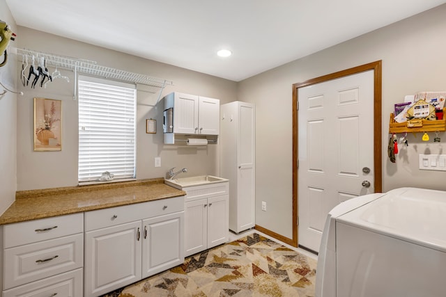22461 Milner St, Saint Clair Shores, MI 48081 - clothes washing area featuring baseboards, cabinet space, a sink, and separate washer and dryer