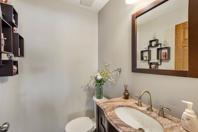 22461 Milner St, Saint Clair Shores, MI 48081 - bathroom with visible vents, toilet, and vanity