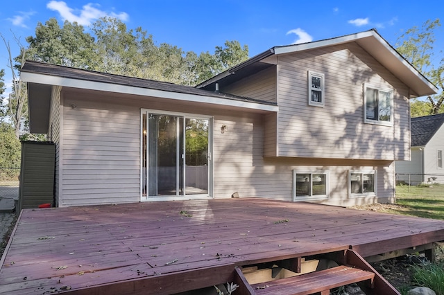 rear view of property with a deck