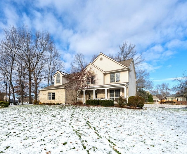 view of property with covered porch